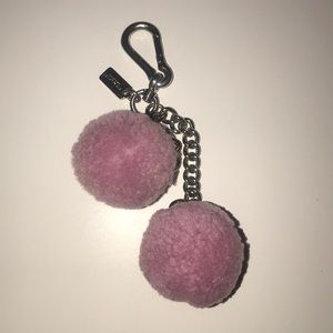 Coach Pom bag charm.